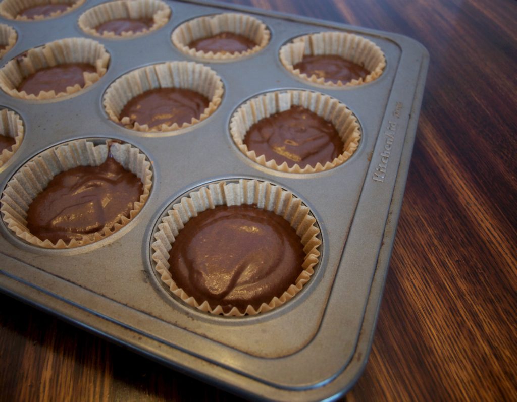black magic cupcake batter in cupcake pan