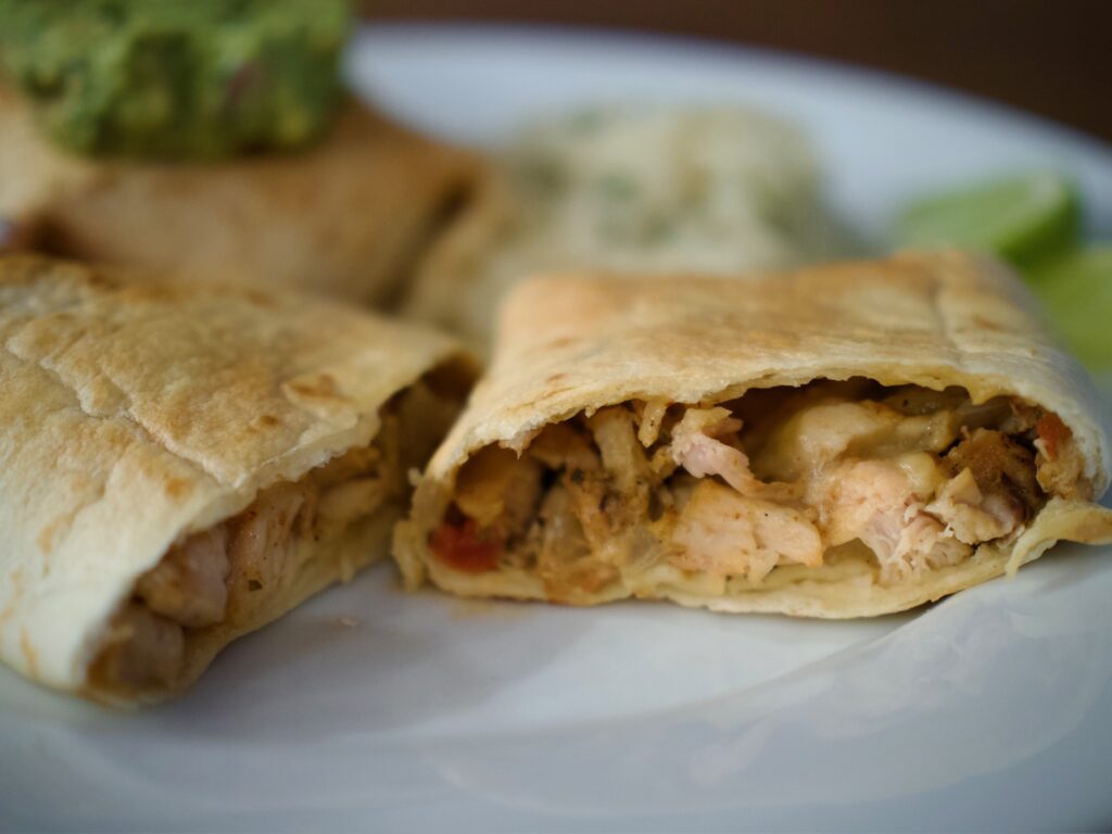 Close-up of cut chimichanga, filling