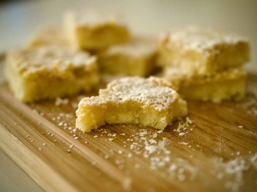 Finished lemon bars with bite taken